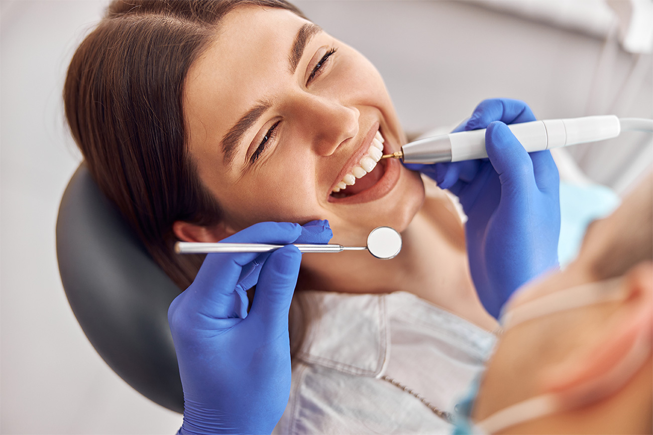Patient smiling during a cosmetic dentistry visit
