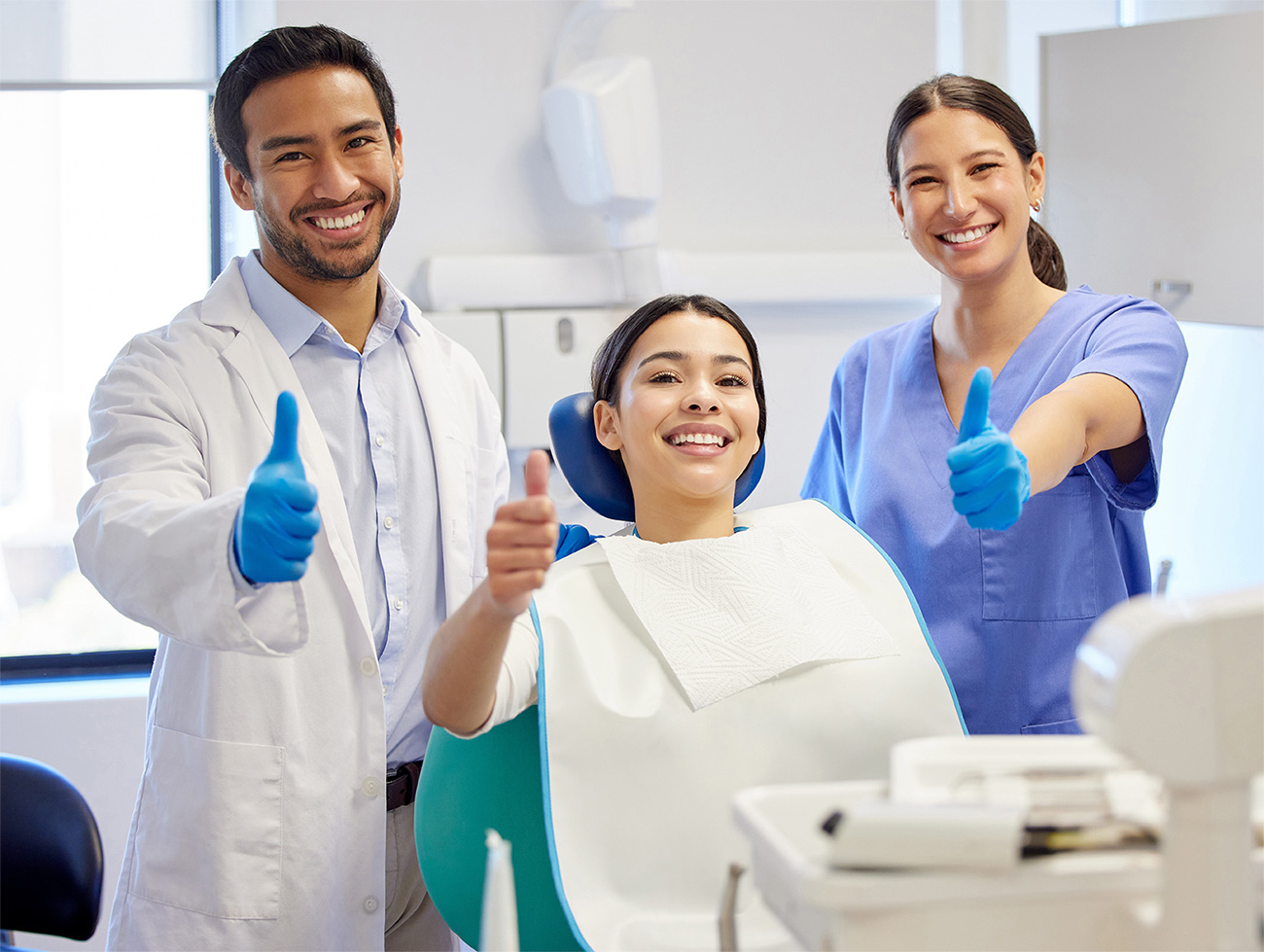 Dental team supporting a patient during a visit